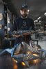 KUST ceramics studio and the founder holds the whale shark lamp on hands