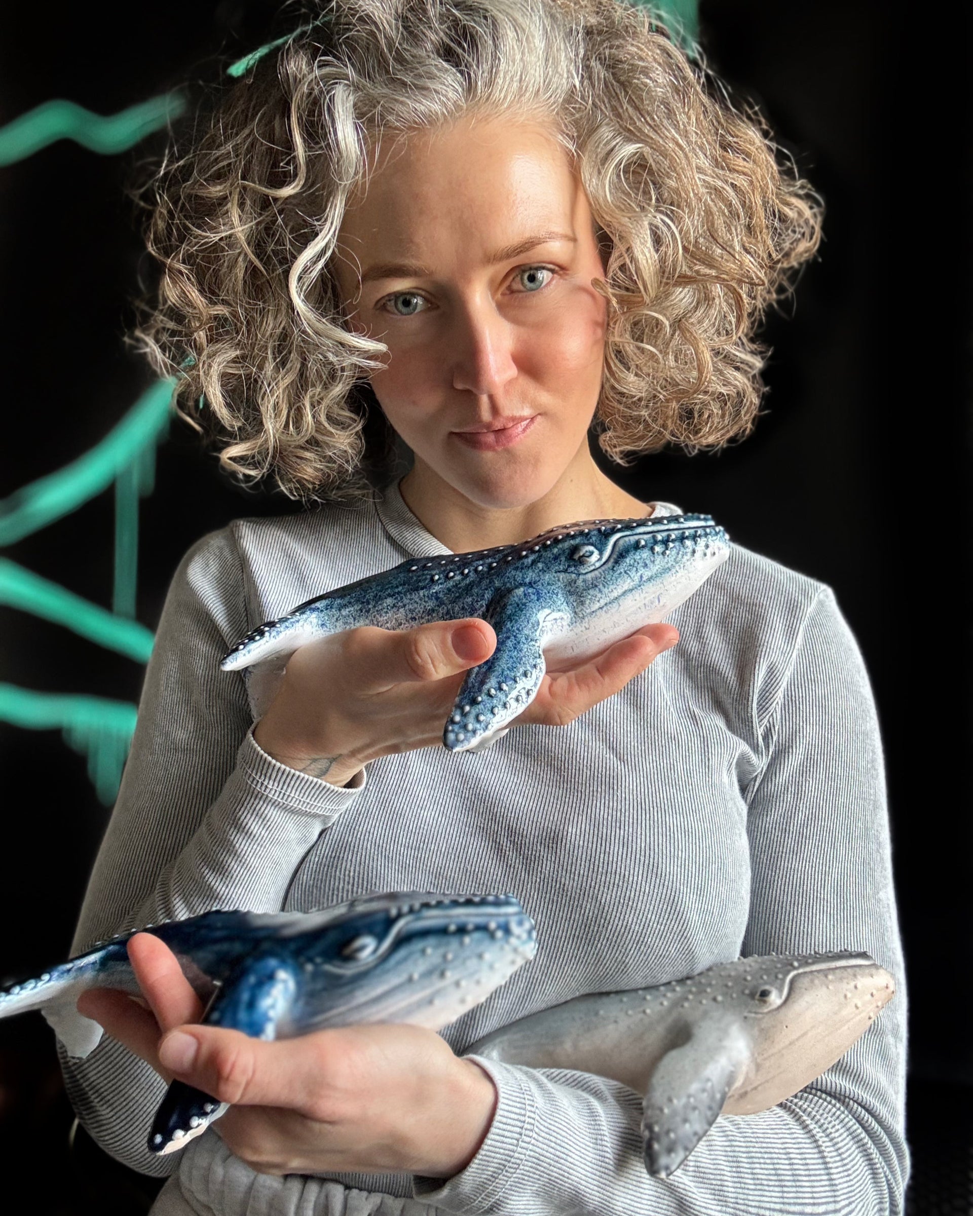 Handmade ceramic figurines collection featuring whale figurines, ocean-inspired ceramic sculptures, and unique handmade art pieces by KUST Ceramics